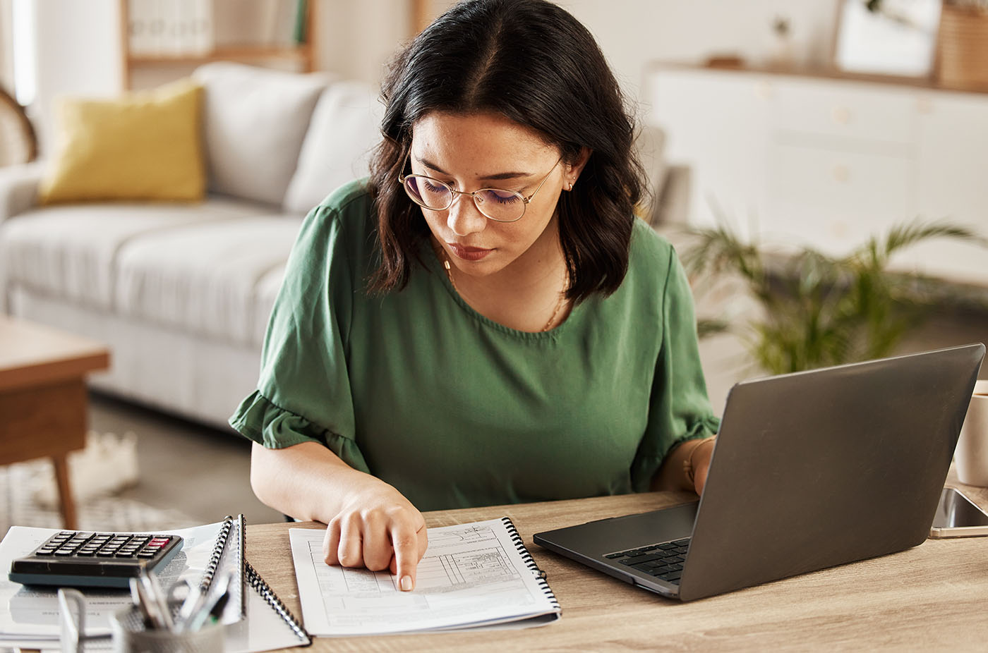 A woman sitting at her computer.